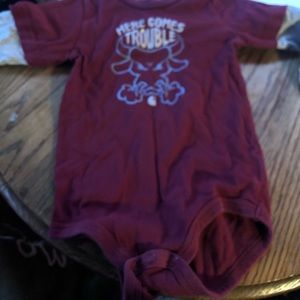 “Here comes trouble” onesie